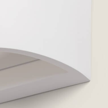 Lichtwerking van wandlamp Sevrano op de muur