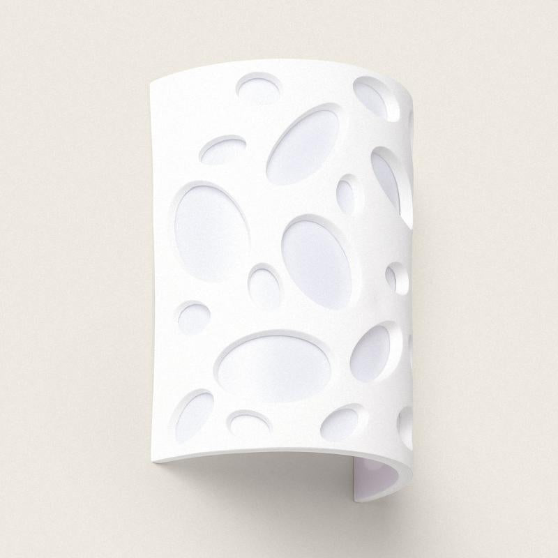Witte gipsen wandlamp Fildaro met uitgespaarde openingen
