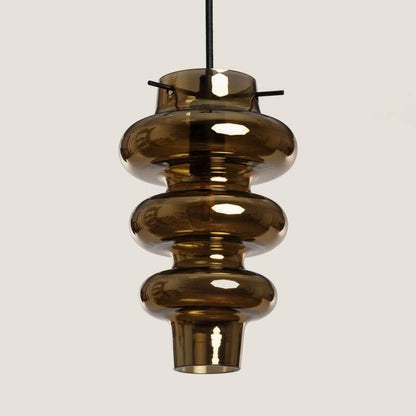 Hanglamp Novrano in goud met gestapelde glazen volumes