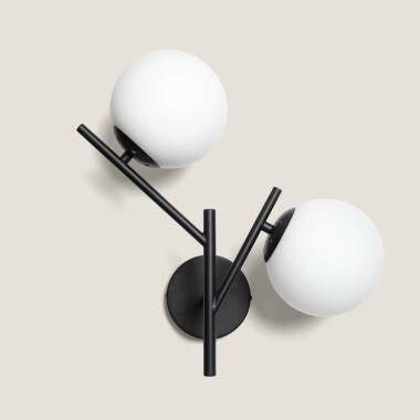 Wandlamp Delvano detail van het metalen frame