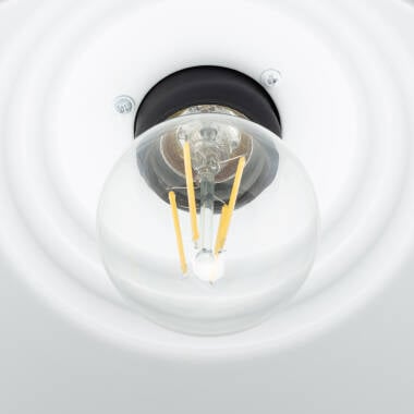 Wandlamp Amblano gemonteerd boven een spiegel